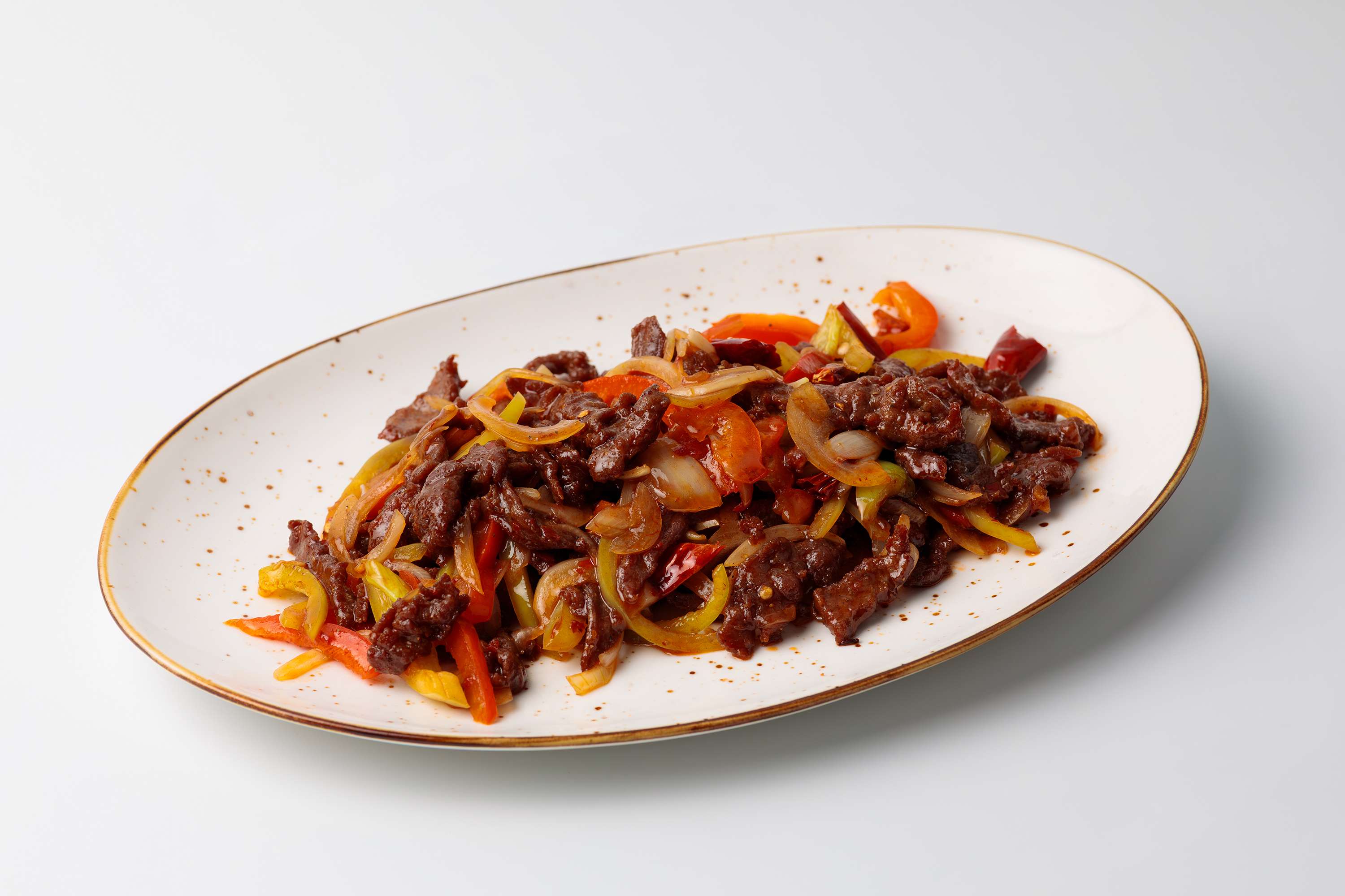 Говядина с луком и перцем