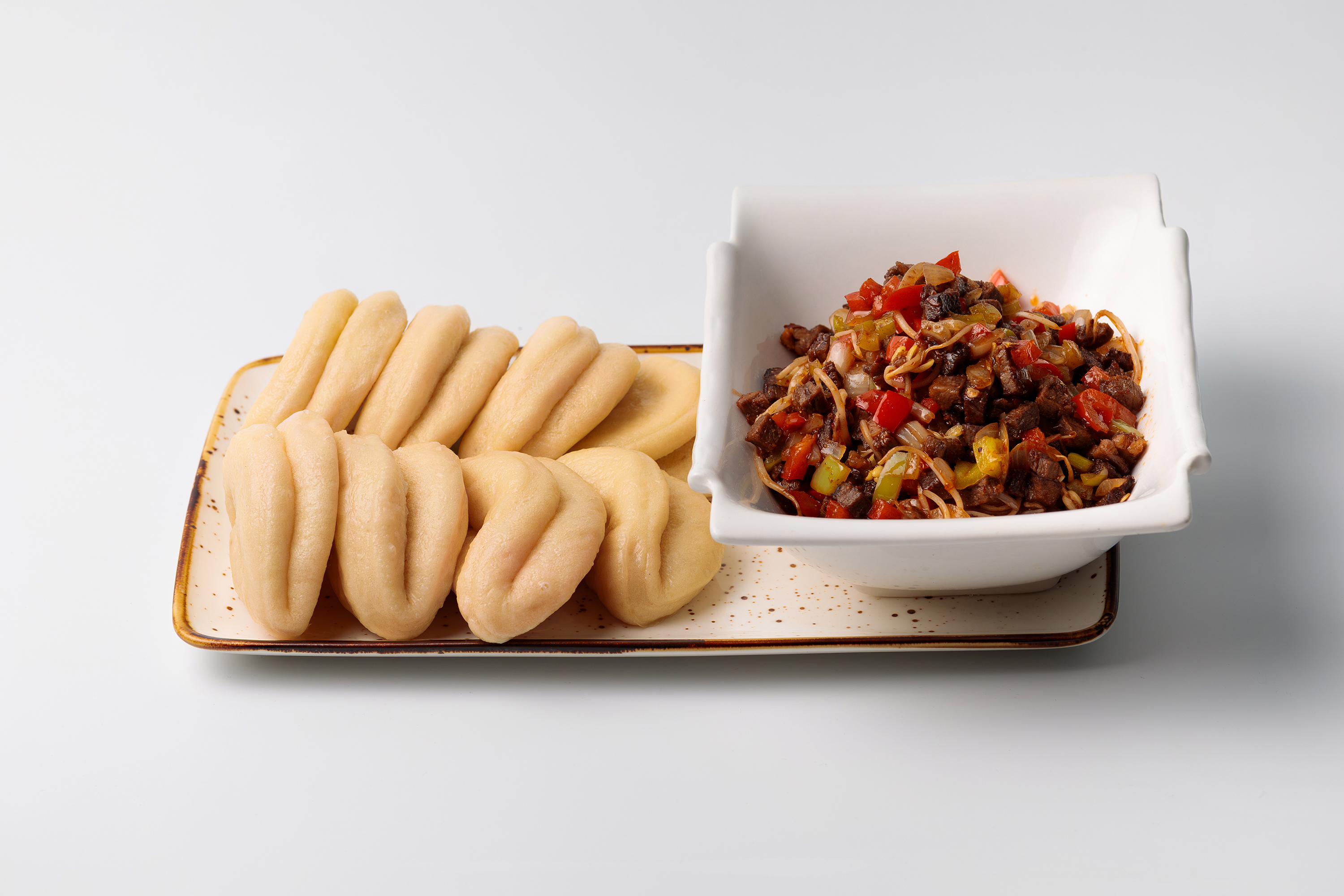 Говядина с пампушками